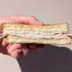 hand holding turkey sandwich